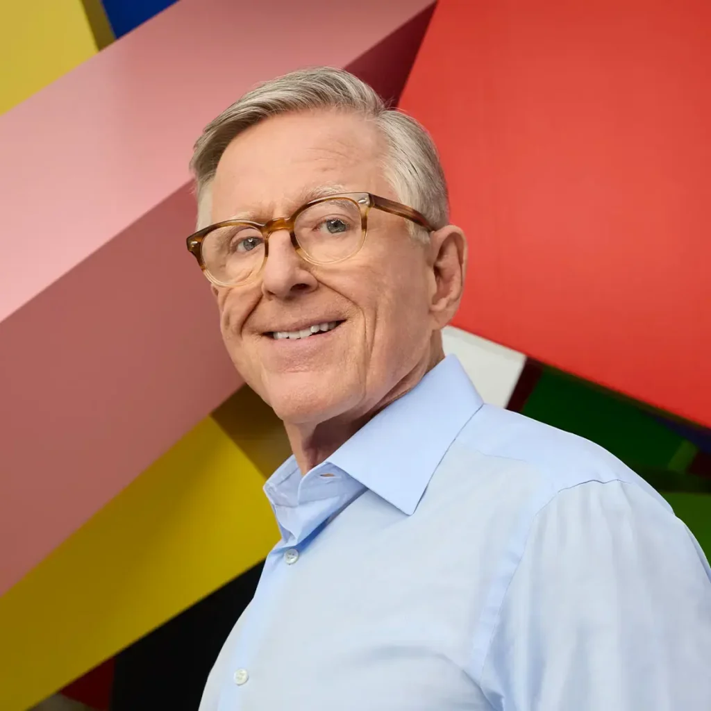 a photo of a man with a colorful background