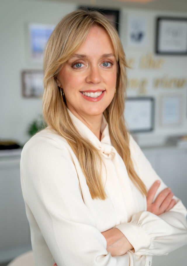 woman in cream shirt