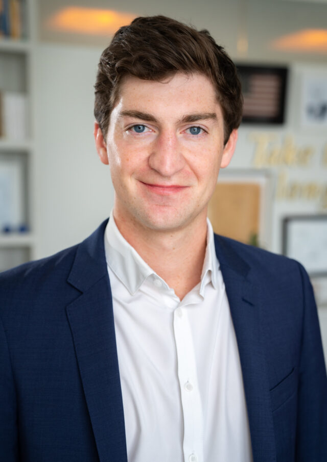 photo of a man in a blue blazer